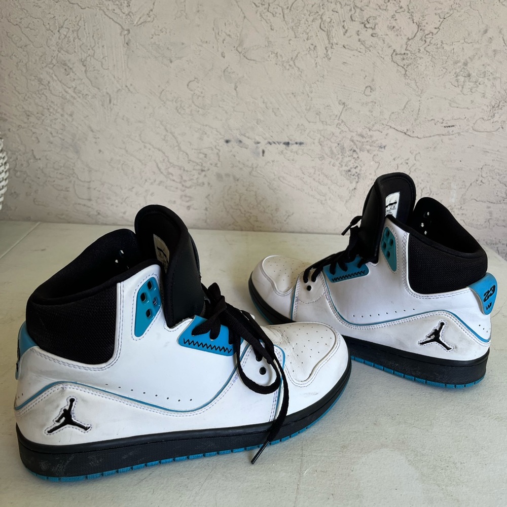 White and light blue Jordan air Nike size 10